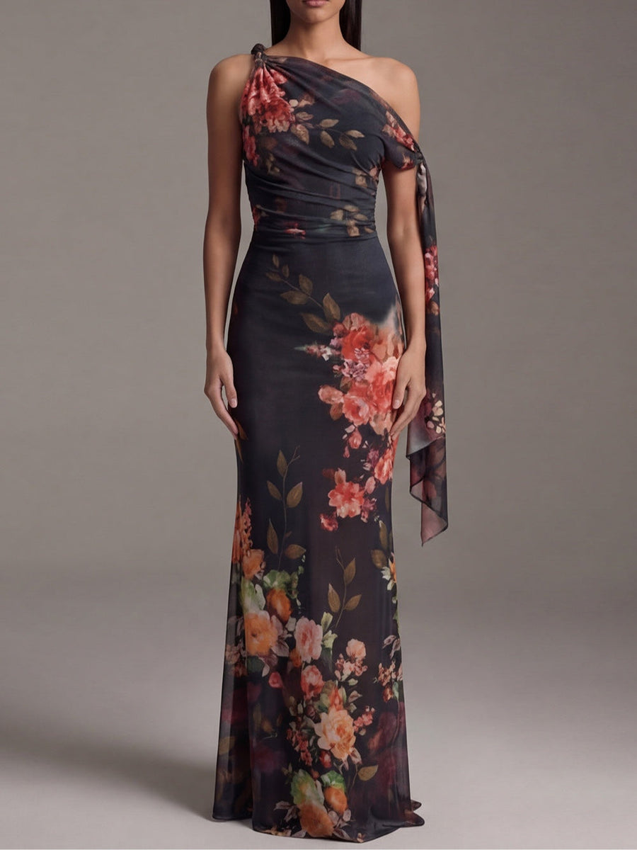Noémie · Vestido Largo Plisado con Estampado Floral y Escote Asimétrico