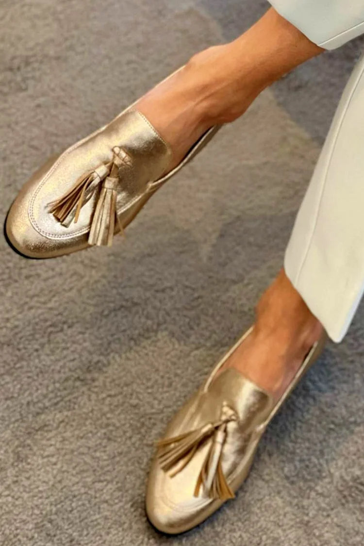 Mocasines brillantes metalizados Dorado con costuras a la vista