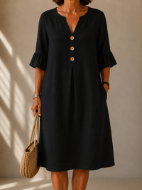 Isabelle · Vestido Negro con Botones y Corte Fluido