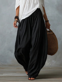 Margaux · Conjunto Blanco de Top con Hombros Descubiertos y Pantalón Lantern