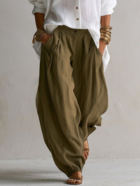 Capucine | Camisa blanca amplia y pantalón balloon verde oliva