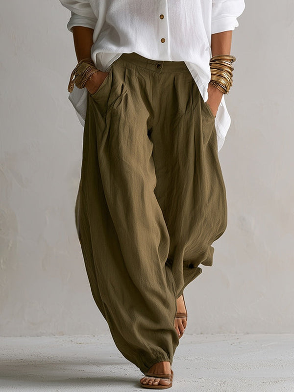Capucine | Camisa blanca amplia y pantalón balloon verde oliva