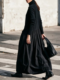 NOIR | Vestido maxi oversize de cuello alto con bolsillos™